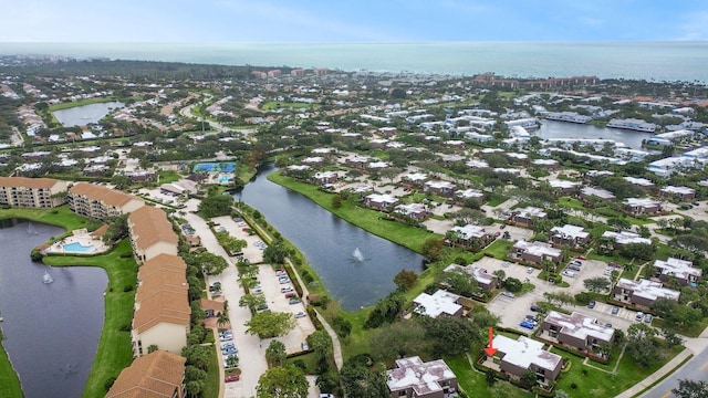 drone / aerial view with a water view