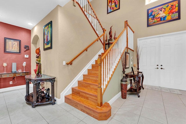 foyer with light tile patterned floors