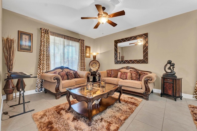 tiled living room with ceiling fan