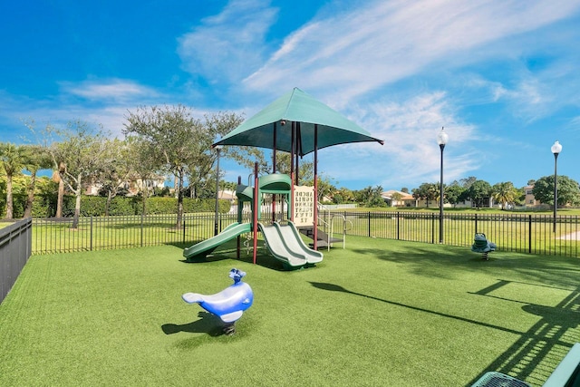 view of playground with a yard