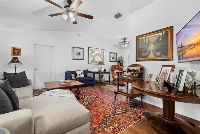 living room featuring hardwood / wood-style floors, ceiling fan, and lofted ceiling