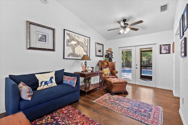 living area with french doors, dark hardwood / wood-style floors, ceiling fan, and lofted ceiling