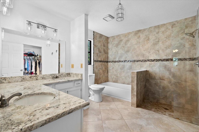 full bathroom with tile patterned floors, vanity, independent shower and bath, and toilet