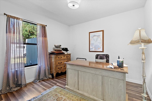 office area with wood-type flooring