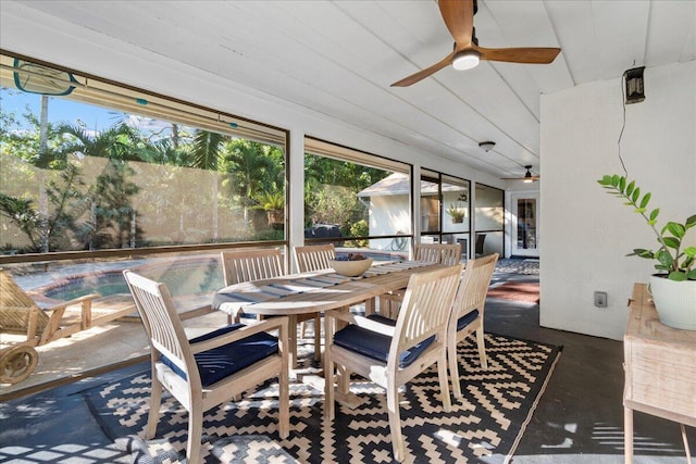 sunroom / solarium featuring wooden ceiling