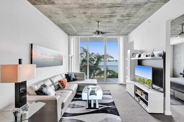 living room featuring light carpet and ceiling fan