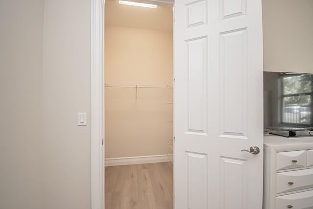 spacious closet with light wood-type flooring