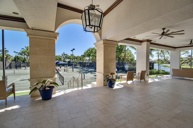 view of patio / terrace featuring ceiling fan