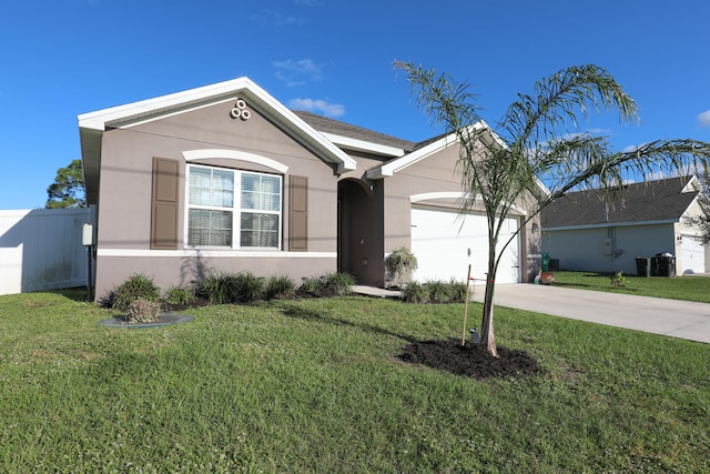 ranch-style house with a garage and a front yard