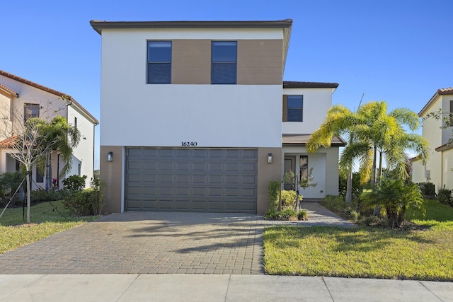 view of front of property with a garage