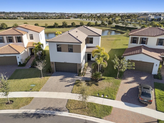 bird's eye view with a water view