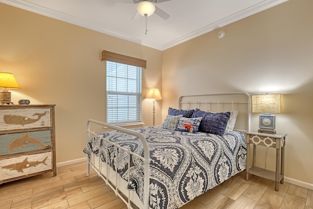 bedroom featuring ceiling fan, light wood-type flooring, and ornamental molding