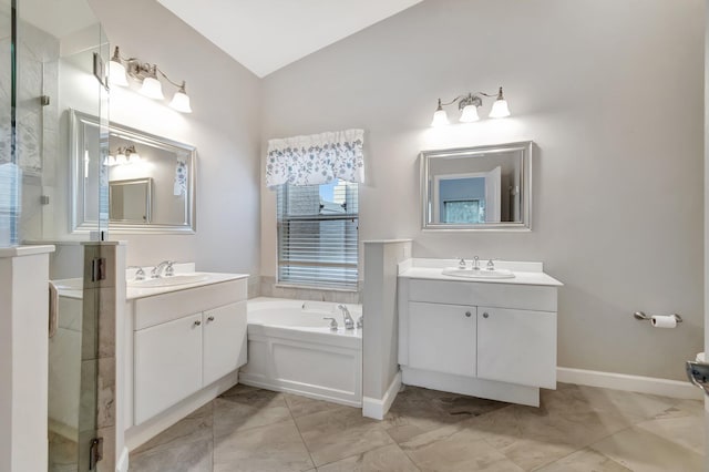 bathroom featuring vanity, vaulted ceiling, and separate shower and tub