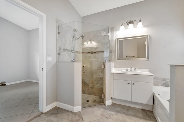 bathroom with separate shower and tub, vanity, and lofted ceiling