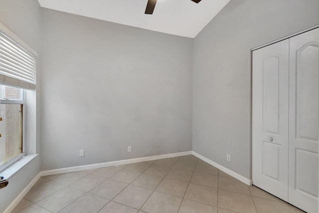 interior space featuring ceiling fan