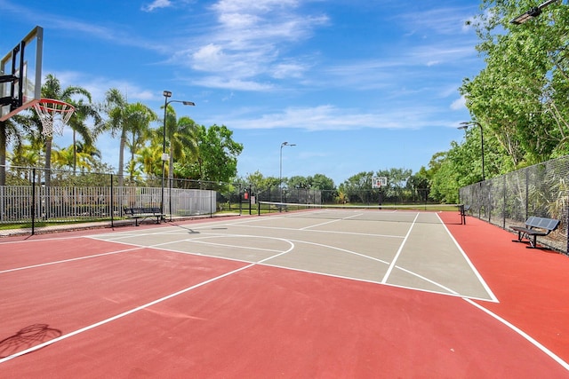 view of sport court featuring tennis court