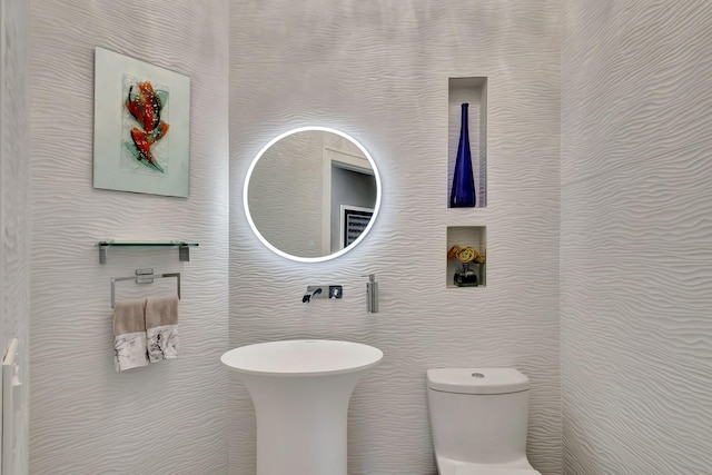 bathroom featuring toilet