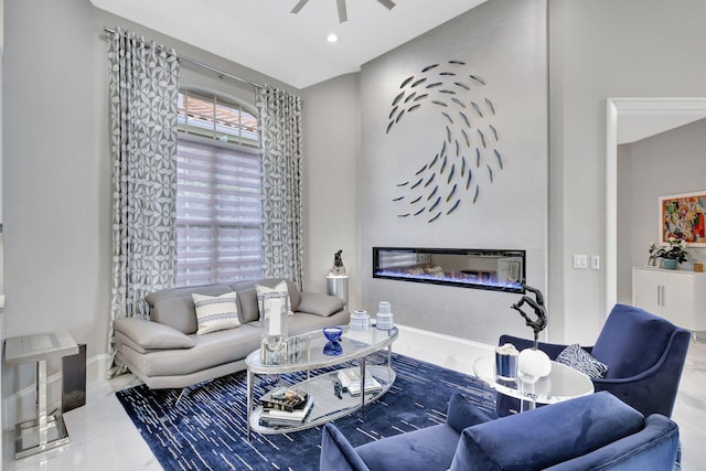 tiled living room with ceiling fan