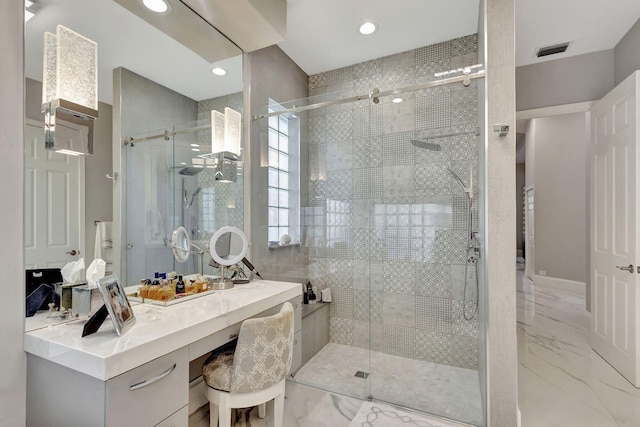 bathroom featuring vanity and walk in shower