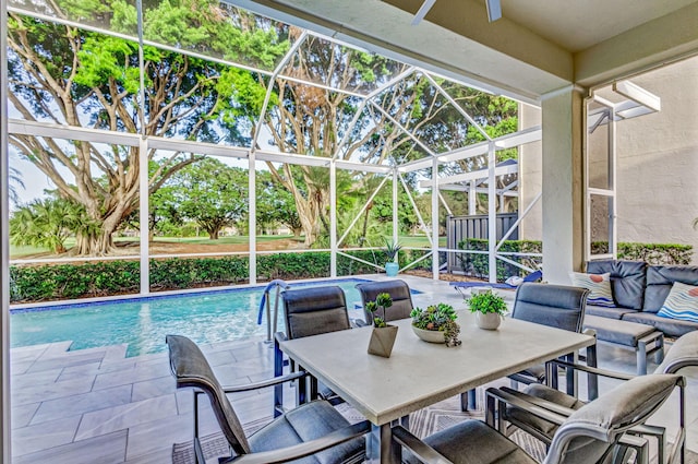 view of patio / terrace featuring glass enclosure