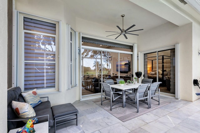 view of patio with ceiling fan