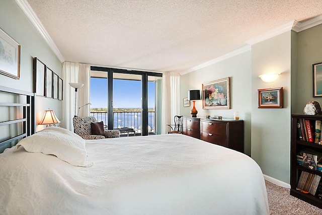 bedroom featuring floor to ceiling windows, access to outside, a water view, carpet flooring, and ornamental molding