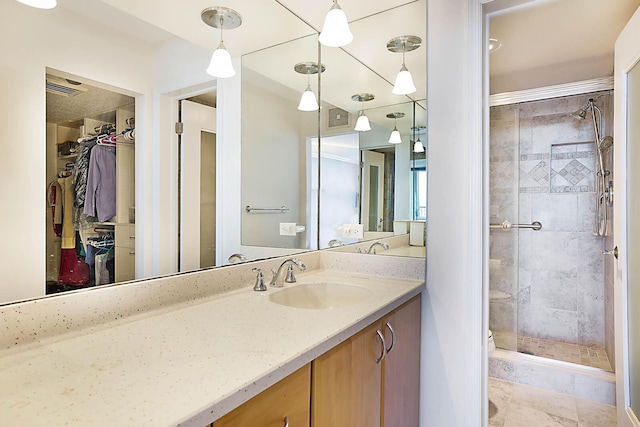 bathroom featuring vanity and walk in shower