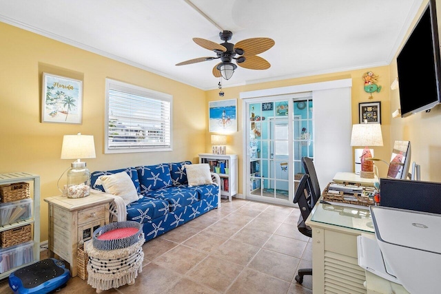 office area with ceiling fan, tile patterned flooring, and crown molding