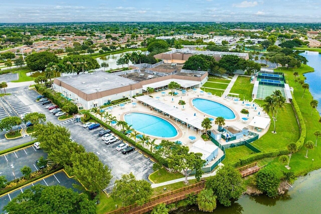 birds eye view of property featuring a water view