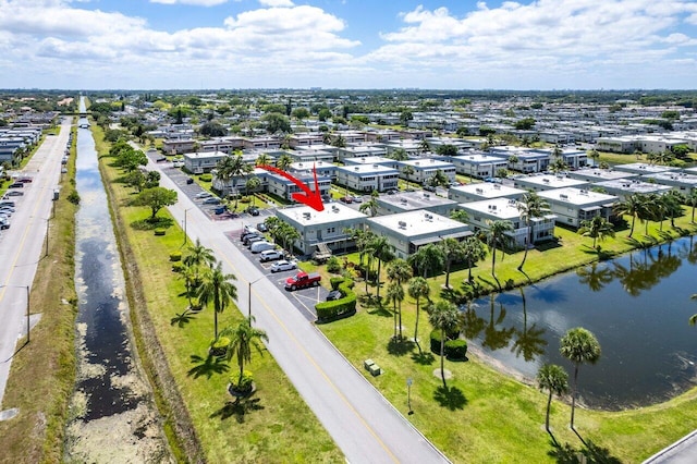 drone / aerial view with a water view