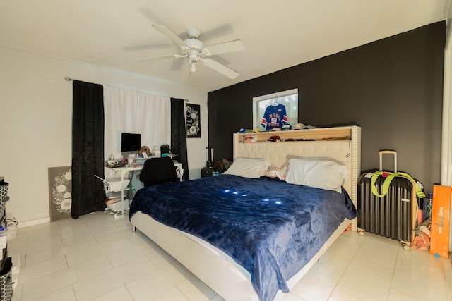 bedroom featuring tile patterned floors, ceiling fan, and radiator heating unit