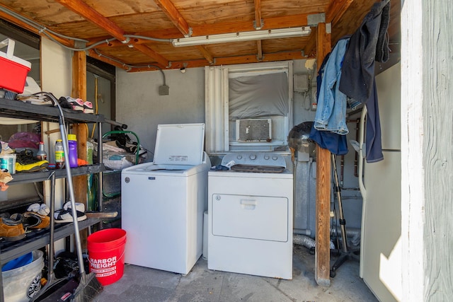 laundry area with washing machine and dryer