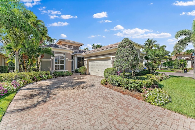 mediterranean / spanish-style home featuring a garage