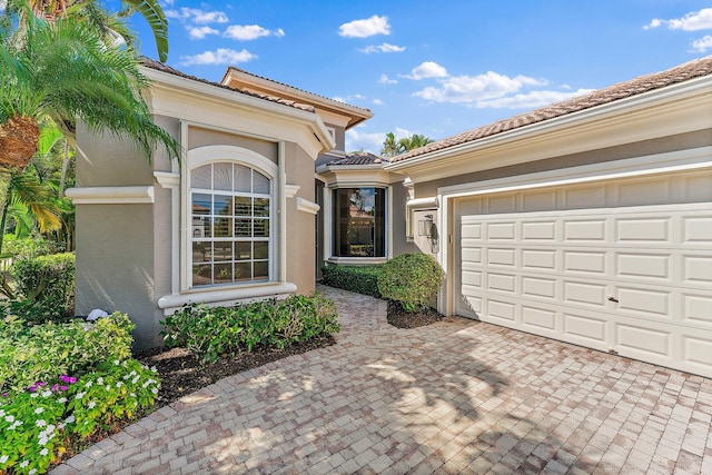 property entrance featuring a garage