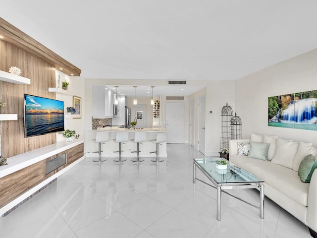 living room featuring wooden walls