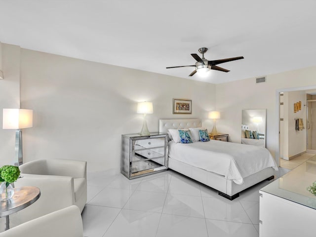 bedroom with light tile patterned floors and ceiling fan