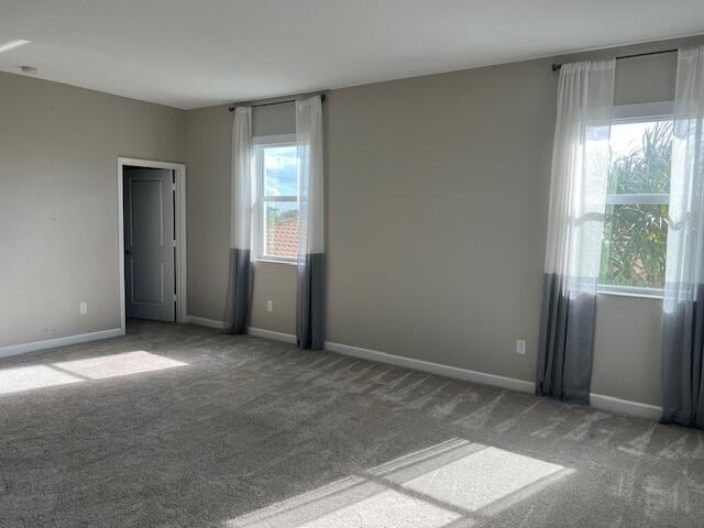 empty room featuring carpet flooring