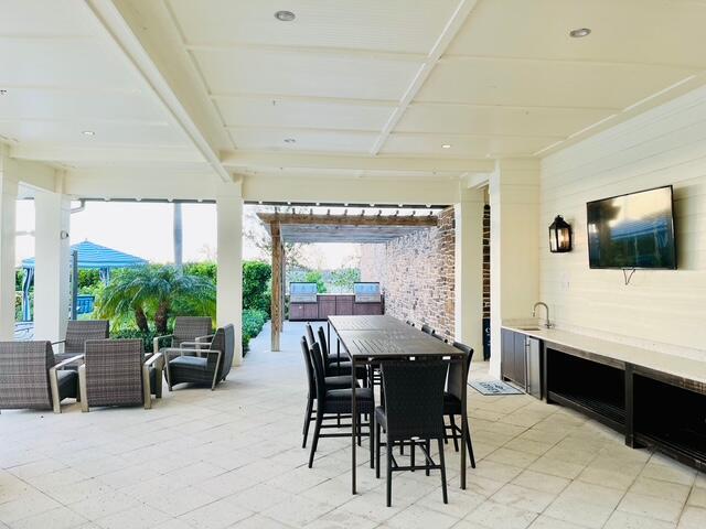 interior space with an outdoor hangout area and sink