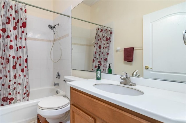 full bathroom featuring shower / bath combo with shower curtain, vanity, and toilet