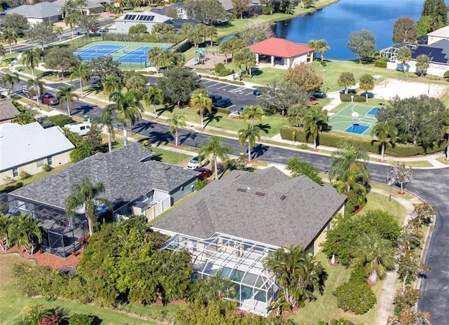 birds eye view of property featuring a water view