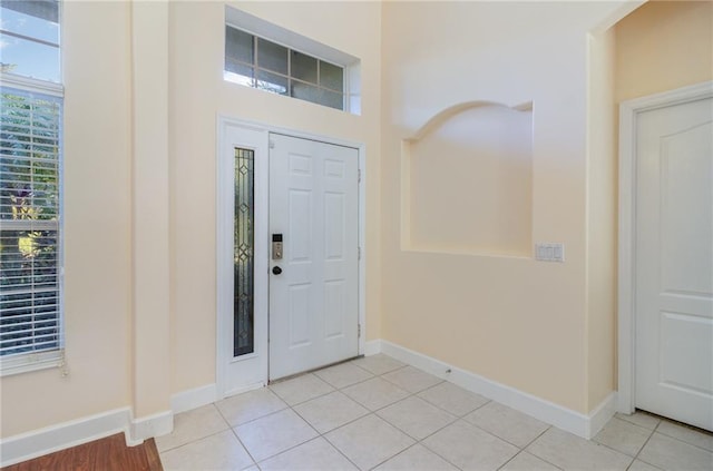 entrance foyer with light tile patterned flooring