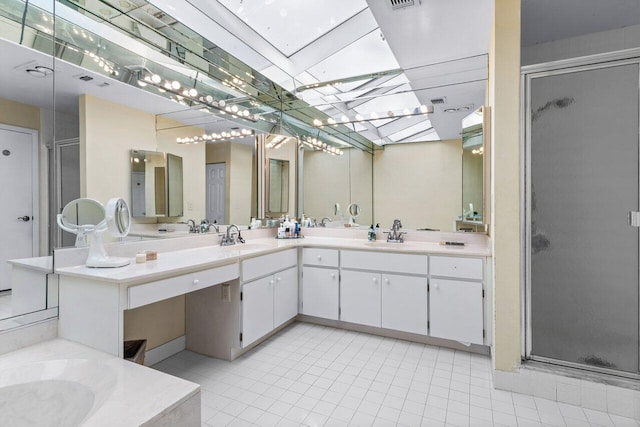 bathroom featuring vanity, tile patterned floors, and independent shower and bath