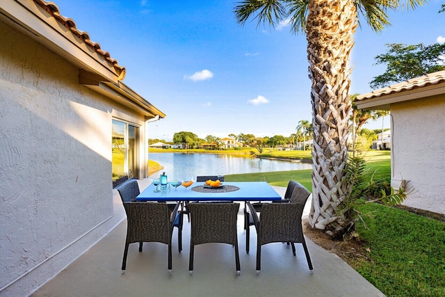 view of patio / terrace featuring a water view