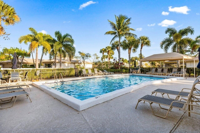 view of swimming pool featuring a patio area