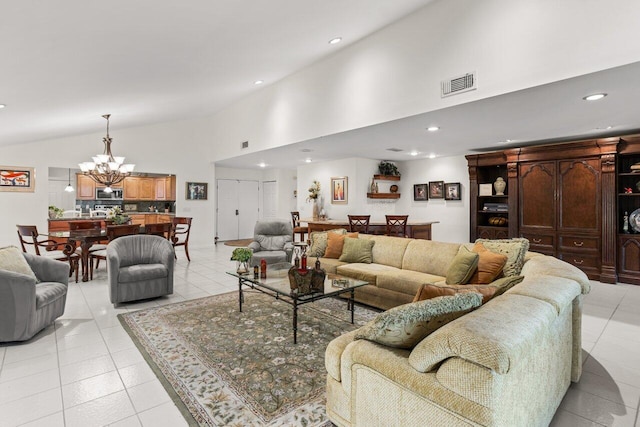 living room with light tile patterned floors, high vaulted ceiling, and a notable chandelier