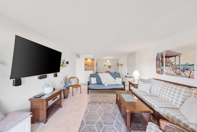 living room with light tile patterned floors