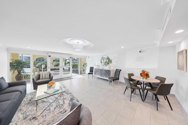 tiled living room featuring french doors