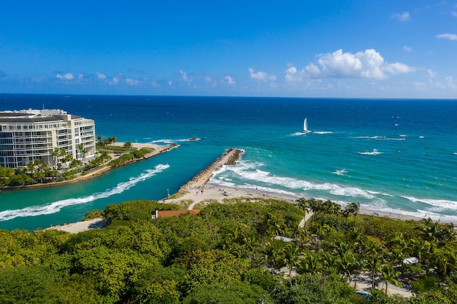 aerial view featuring a water view and a view of the beach