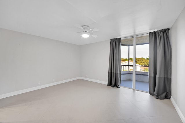 unfurnished room with ceiling fan