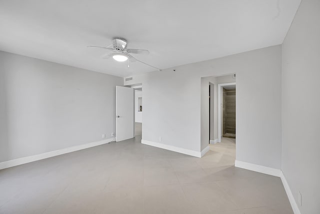 unfurnished room with ceiling fan